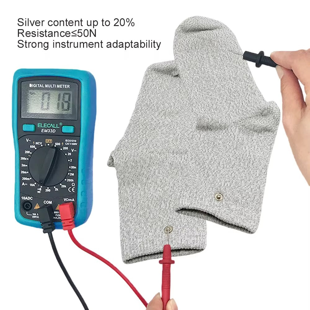 Digital multimeter with wires being used on grounding socks.