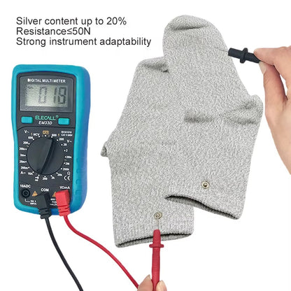 Digital multimeter with wires being used on grounding socks.
