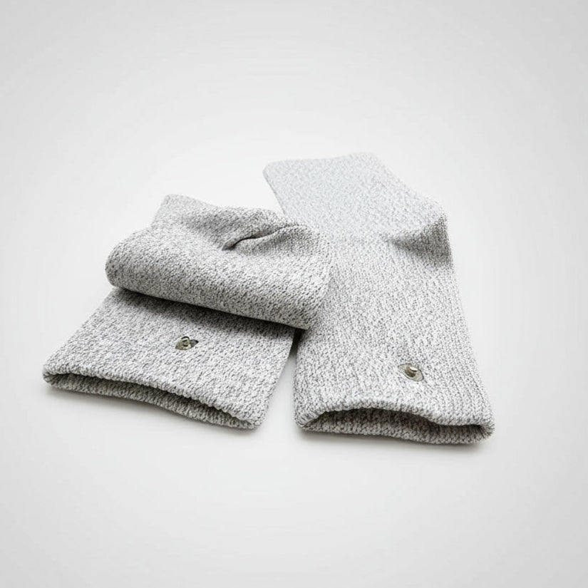 Folded gray grounding socks socks with elastic closure on a white background